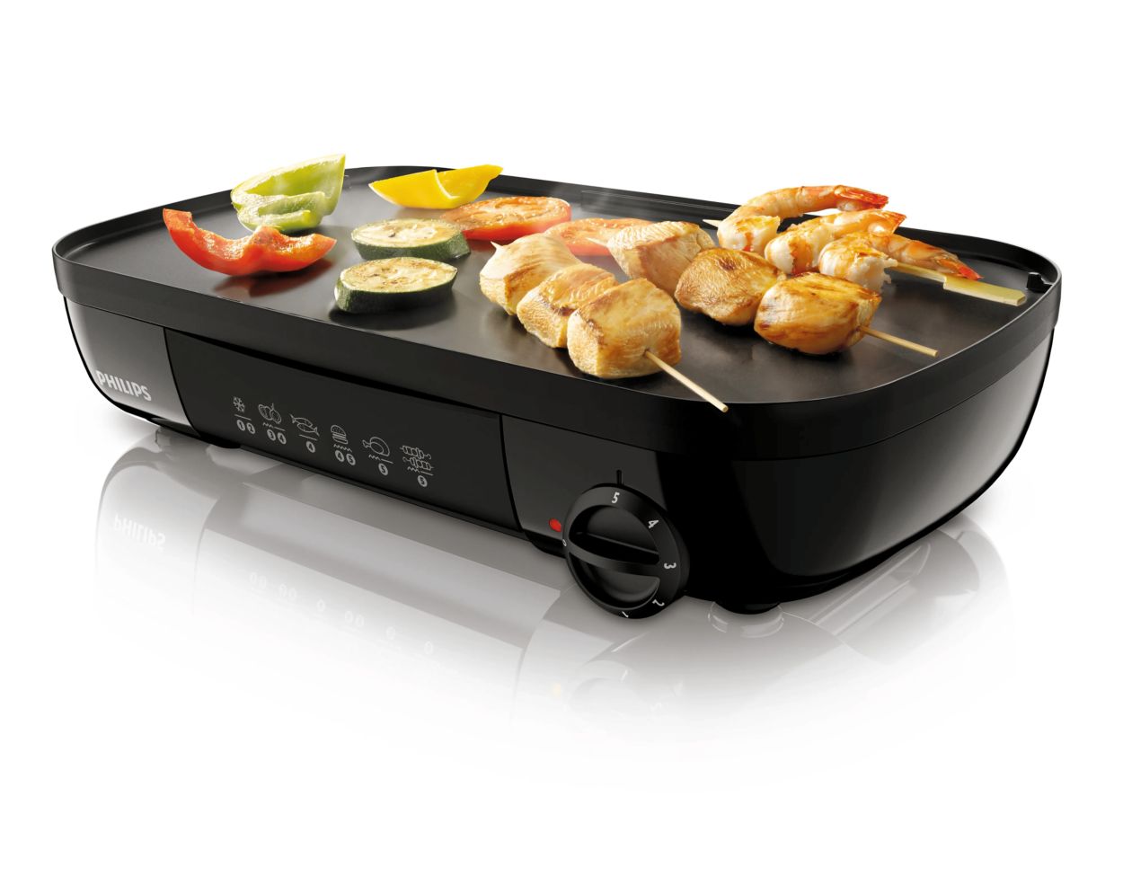 Faites pivoter la plaque pour des grillades &agrave; votre go&ucirc;t