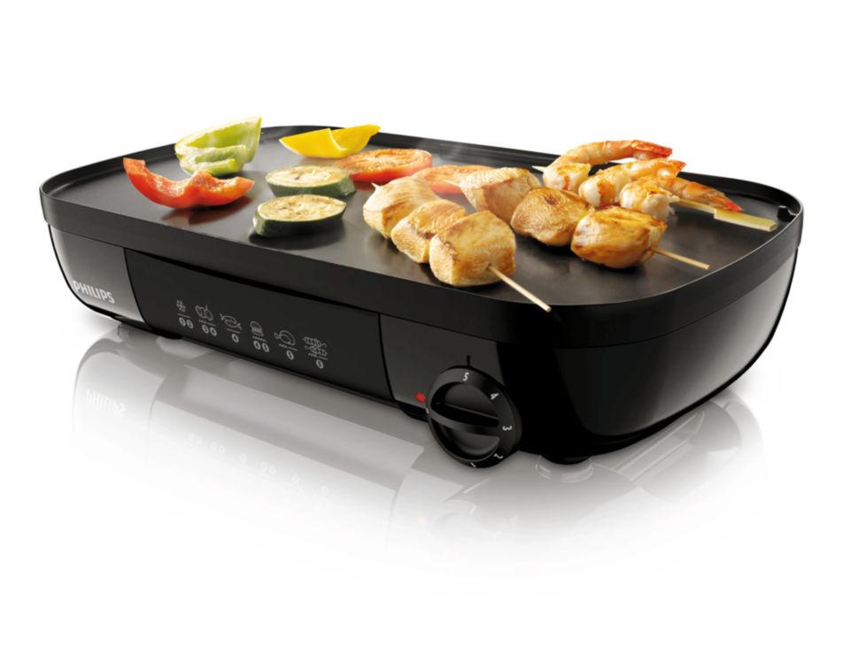 Faites pivoter la plaque pour des grillades &agrave; votre go&ucirc;t