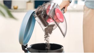 Wadah debu yang didesain dapat dikosongkan secara higienis dengan satu tangan