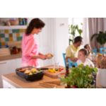 Gire la placa para asar a su manera