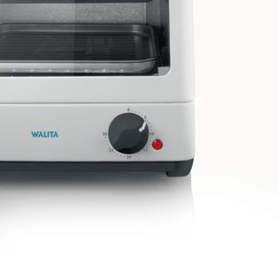 O timer de 30 minutos desliga o miniforno no final do tempo programado