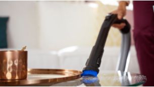 Zachte borstel ge&iuml;ntegreerd in handvat, altijd klaar voor gebruik