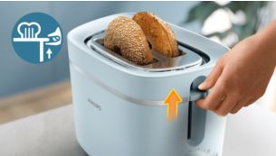 Verwijder veilig kleine stukjes brood met de lifthendel