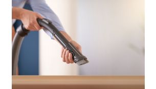 Soft brush integrated into handle, always ready to use