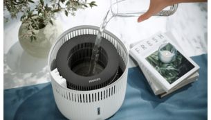R&eacute;servoir d'eau &agrave; remplir par le haut, pour plus de simplicit&eacute;