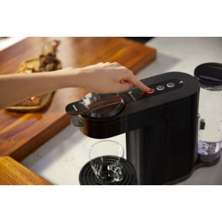 Machine à café à dosettes et filtre