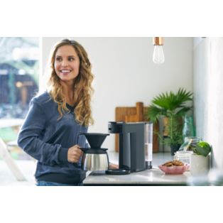 Machine à café à dosettes et filtre